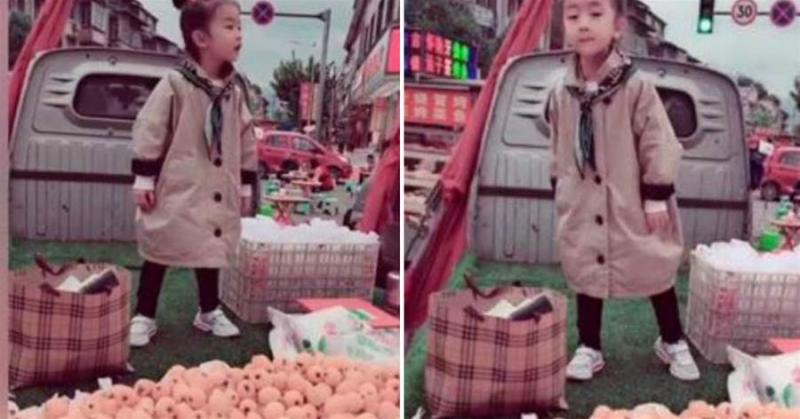 女兒幫爸爸擺攤賣水果，個子瘦小站車頂，吆喝聲響亮不害羞，網友：懂事的孩子真好